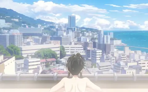Kinme looking at the scenery from the big bath room. Standard, but the city looks stunning from there.